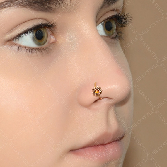 Golden 3 Stone Dangle Nose Ring at Rs 50 in Varanasi | ID: 17531328655