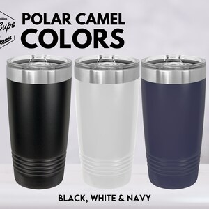 a couple of cups that are on a table