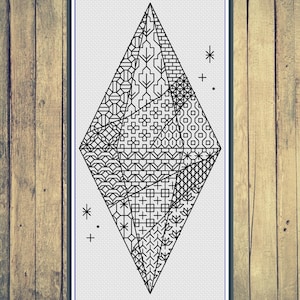 May include: Black and white geometric diamond pattern with a variety of intricate designs. The diamond is outlined in black and has a white background.