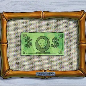 May include: A framed green bill with dollar signs and a seashell emblem. The bill is centered on a woven background within a bamboo-style frame. The frame is a warm, golden brown color.