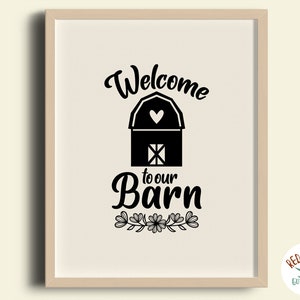 May include: Black and white printable wall art featuring a barn with a heart on the roof and the text "Welcome to our Barn". The barn is surrounded by a floral design.