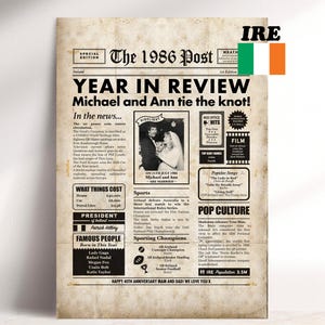 May include: A vintage-style print resembling a newspaper front page from 1986. The headline reads "The 1986 Post" with the title "Year in Review." It features articles, photos, and a headline about Michael and Ann. The Irish flag is in the upper right corner.