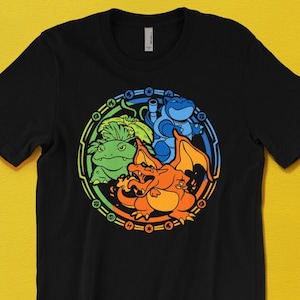 Camiseta de las evoluciones iniciales del set básico // Charizard, Venusaur y Blastoise // Inspirada en las cartas Pokémon