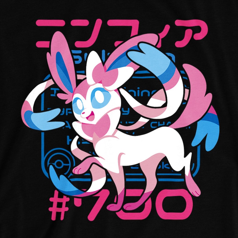 May include: Black t-shirt featuring a Sylveon graphic. The design includes a pink, white, and blue Sylveon character with Japanese text and the number 700 in pink. The background has blue lines and text.