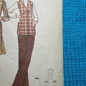May include: A vintage sewing pattern for a vest, skirt, and pants. The pattern includes a plaid vest with a white collar, a brown skirt, and brown pants. The pattern is for sizes 8-16.