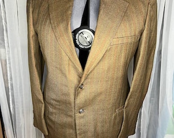 Blazer de los años 80 con rayas verticales en color tostado, naranja, amarillo y azul.