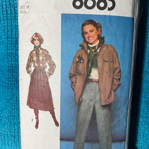 May include: Vintage Simplicity sewing pattern 8683, size 10 Miss. The pattern features illustrations of women's outfits, including a jacket, pants, and skirt. The pattern's cover has a blue background and the Simplicity logo.