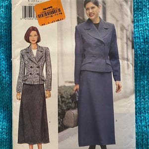 May include: A vintage Butterick sewing pattern, size 8-10-12, featuring illustrations of a double-breasted suit and a skirt suit. The pattern includes a barcode and the text "6263 Butterick". The background is a teal knitted fabric.