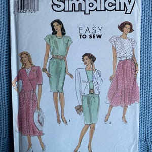 May include: Simplicity sewing pattern number 7164, size H5 (6-14) for easy to sew dresses. The pattern shows four different styles of dresses, including a polka dot dress, a green dress with a belt, and a green dress with a white jacket. The pattern is printed on white paper with black text.