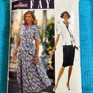 May include: A vintage sewing pattern for Leslie Fay designs. The pattern features two women's fashion designs: a floral print dress and a white jacket with a black skirt. The pattern is labeled "Butterick" and includes the size range 6-8-10.