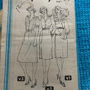 May include: Simplicity sewing pattern number 9781, page 1, size 12, with three illustrations of women wearing different versions of the pattern. The pattern includes three versions, labeled V1, V2, and V3.