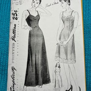 May include: Vintage Simplicity sewing pattern for a slip dress. The pattern is printed on a white paper with black ink and shows three different styles of slips. The pattern number is 1997 and the size is 16 with a bust measurement of 34 inches. The pattern is priced at 25 cents.