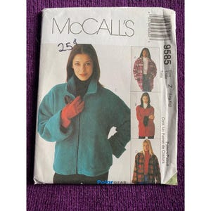 May include: A sewing pattern for a jacket, McCall's pattern number 9585, size Z (large, extra large). The pattern includes instructions for making a jacket with a zipper closure, pockets, and a collar. The pattern is for a jacket made of fleece fabric.