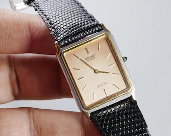 時計 SEIKO DOLCE 5E32-6E10 QUARTZ ROMAN DIAL Seiko Dolce Watch Men 29mm Champagne Dial Gold Date
