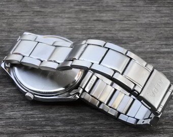 【ぐち】SEIKO セイコー ALBA タンク シルバー文字盤 Vintage Seiko Alba Solar Energy White Dial Kanji Day Date V158