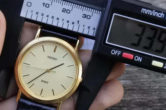 Vintage Seiko Spirit 5E21 6C00 Golden Dial Men Quartz Watch Japan