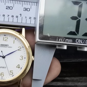 SEIKO SPIRIT オールドクオーツ スイープセコンド 5S21-6000 セイコー SPIRIT スピリット スイープセコンド クォーツ 希少モデル