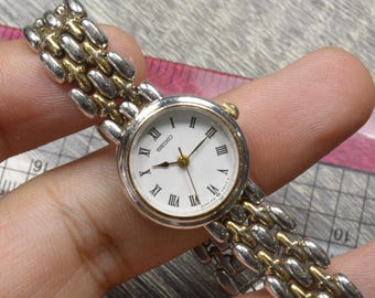 SEIKO クォーツ腕時計　ピンク　シルバー　1F21-0BA0 26Pダイヤ 2025年最新】セイコー 1f20の人気アイテム - メルカリ