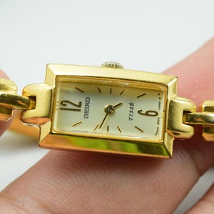 Vintage Seiko Tisse 2E20 7310 Yellow Dial Lady Quartz Watch Japan JDM Tank Shape 14mm