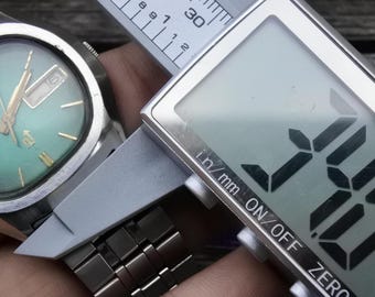 Vintage Seiko Elnix 0703 5000 Green Dial Men Quartz Watch Japan