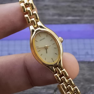 Seiko Tisse 1F21‑5A00 ゴールド Seiko Oval 1F21-5A00 Vintage Women's Watch in Gold