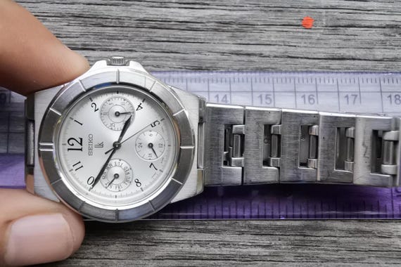 Orologio da donna al quarzo con bracciale integrato placcato oro