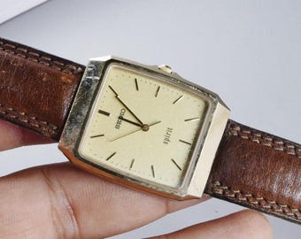 新品未使用】SEIKO クオーツ 腕時計防水1F21-5A60ゴールド