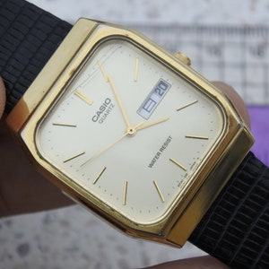 Vintage Casio Kanji Day Date 709 MQ-518 Men Quartz Watch Japan