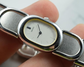 Vintage Seiko 1E20 5590 Yellow Dial Lady Quartz Watch Japan Oval