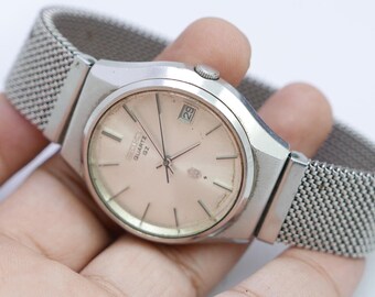Vintage Alba Urban V806 0140 Sun Moon Dial Unisex Quartz