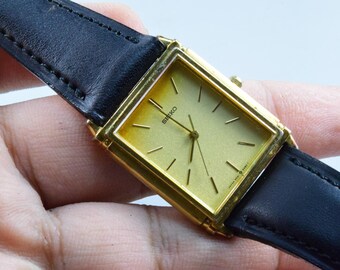 green emerald velvet dress Seiko Tank Quartz 5P31-5049  The Wrist Watcher