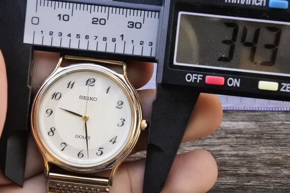 Vintage Seiko Dolce 5E61 0A20 IRIDESCENT DIAL Men Quartz Watch