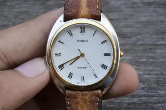超特価激安 Lucent Seiko Vintage 5E21 Quartz Men Dial Numeral Roman 6E50 腕時計