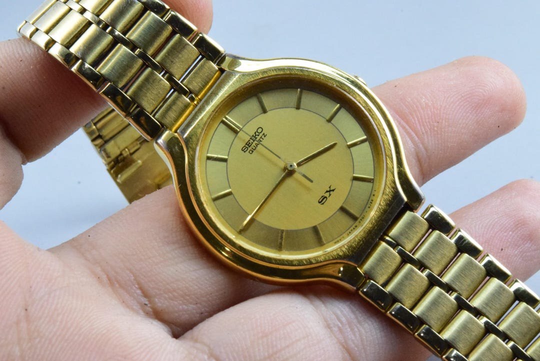 SEIKO 掛時計 大小セット ゴールド il_1080xN.7742457683_fhmg.jpg