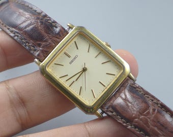 ✨SEIKO✨セイコー✨クォーツ✨7N01-6B20✨ゴールド文字盤✨腕時計✨ ヴィンテージ セイコー 7N01 5020 イエロー文字盤 ユニセックス