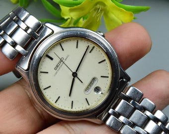 Reloj vintage Seiko Contemporary Basic 5H23 6B90 para hombre, esfera blanca, cuarzo, pulsera plateada, Japón JDM, forma redonda, 35 mm