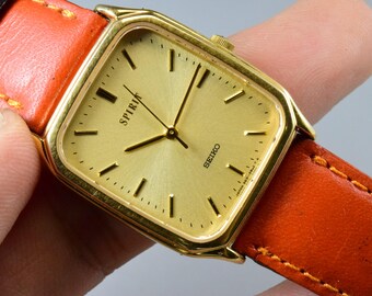 slim fit dress slacks Seiko Tank Quartz 5P31-5049  The Wrist Watcher