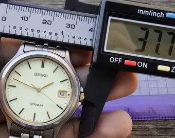 【新品電池タグ付き】SEIKO TITANIUM 夜光文字盤　7N42-8A60 s-l400.jpg
