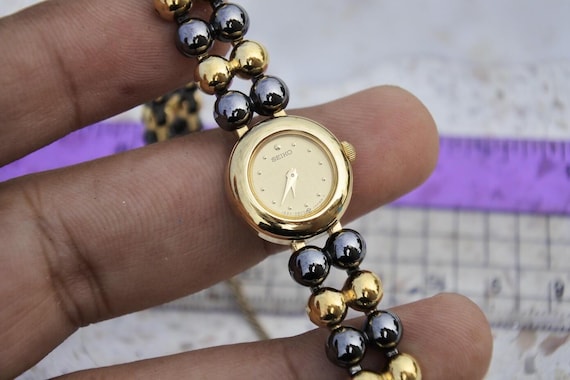 Vintage Seiko 1E20 0290 Integrated Bracelet Lady Quartz Watch