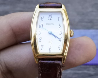 【稼働】SEIKO セイコー クオーツ 1F21-5C10 ノイエ アイボリー Yahoo!オークション -「seiko 1f21」(その他) (セイコー)の落札