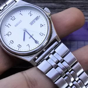ヴィンテージ セイコー スピリット 7N48 7000 シルバー ダイヤル メンズ クォーツ 腕時計 日本製 ラウンドシェイプ 38 mm