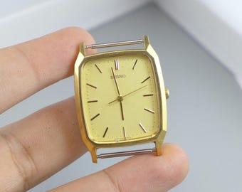 Vintage Seiko Gold Plated 5P31 5C50 Yellow Dial Men Quartz Watch Japan Square Tank Shape 28mm - Etsy Vintage Seiko Gold Plated 5P31 5C50 Yellow Dial Men Quartz Watch Japan Square Tank Shape 28mm - Etsy