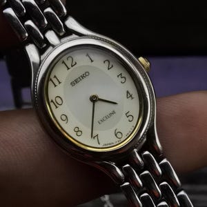 SEIKO EXCEINE シェル文字盤1F20-6H00 クォーツ 腕時計 SEIKO EXCEINE シェル文字盤1F20-6H00 クォーツ 腕時計 - メルカリ