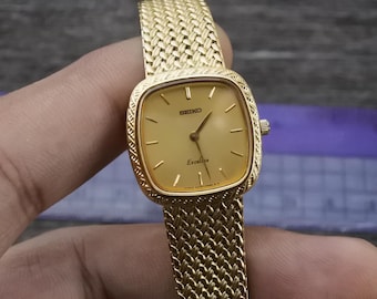 Vintage Seiko 1400 0670 Integrated Bracelet Lady Quartz Watch Japan JDM Round Shape 20mm