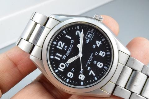 島様 Vintage Seiko Titanium 7N42 8260 Black Dial Men Quartz Watch Japan