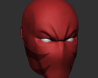 May include: A red mask with a stylized design around the eyes. The mask is made of a smooth, sculpted material.