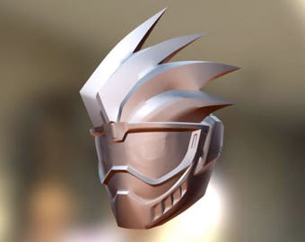 May include: A white plastic helmet with a sharp, angular design. The helmet has a visor and a series of ridges on the top.