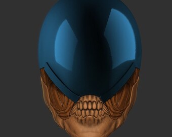 May include: A blue helmet with a skull-like design underneath. The helmet has a smooth, shiny surface and the skull is detailed with teeth and a jawline.