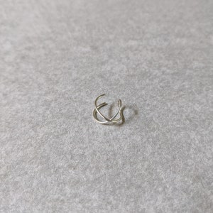 Cris cross sterling silver wire ear cuff, no piercing required. Made with dainty wire, for daily wear