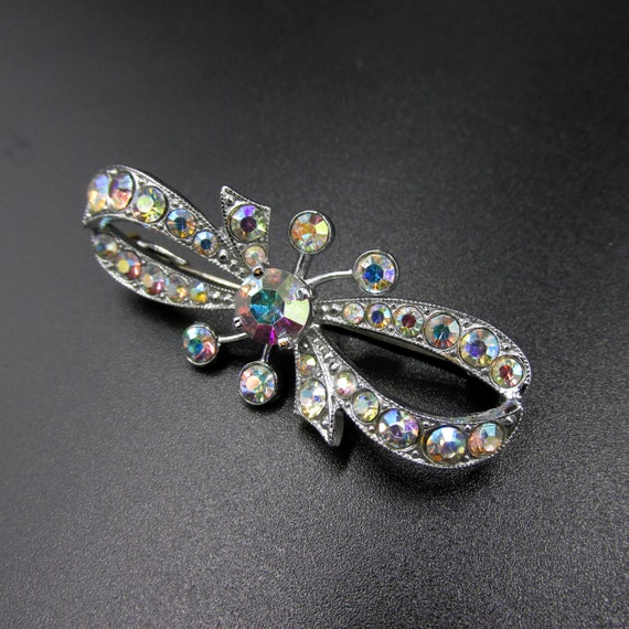 Vintage knot brooch in chrome metal and rainbow-c… - image 6